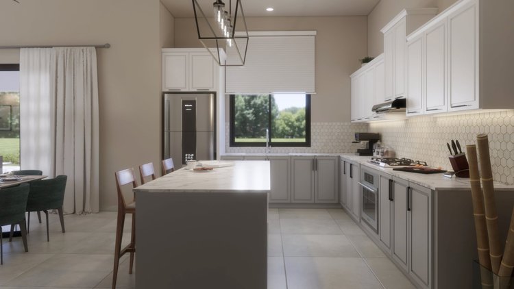 Modern kitchen with white cabinets, a marble island, stainless steel refrigerator, and a window showing greenery outside.